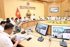 会议场景。图自越通社