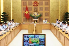 会议现场。图自越通社