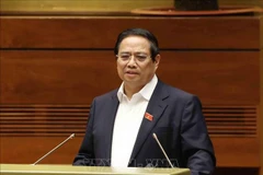 范明政总理。图自越通社