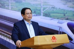 范明政总理发表讲话。图自越通社