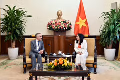 会见现场。图自越通社