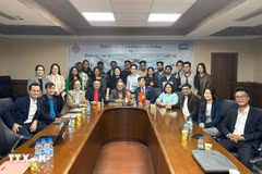 与会代表合影留念。图自越通社