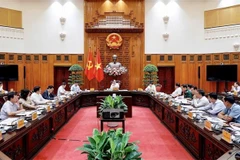 会议场景。图自越通社