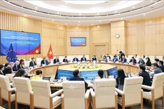 会议现场。图自越通社