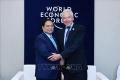 越南政府总理范明政会见世界经济论坛领导人
