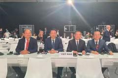 胡德福出席第四届国际发展融资会议会见国际组织和各国官员。图自越通社