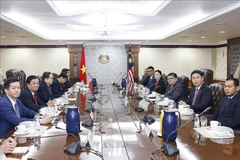 会谈现场。图自越通社