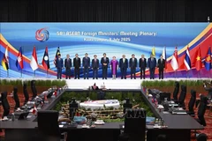 与会代表合影。图自越通社