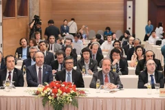 国内外记者出席国际新闻发布会。图自越通社