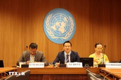 越南常驻联合国日内瓦办事处和瑞士其他国际组织代表团团长梅潘勇发表讲话。图自越通社