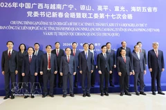 与会代表合影。图自越通社