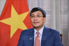 越南外交部常务副部长、越南UNESCO国家委员会主席阮明宇。图自越通社