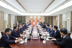 会谈现场。图自越通社