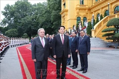越南国家主席梁强主持隆重仪式 欢迎联合国秘书长正式访越。图自越通社