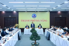 工作会议现场。图自越通社