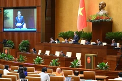 会议场景。图自越通社