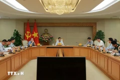 会议场景。图自越通社