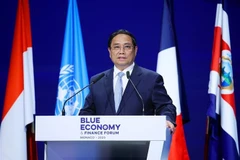越南政府总理范明政发表讲话。图自越通社
