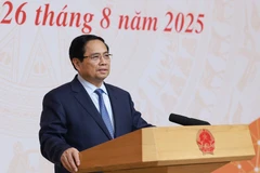 越南政府总理范明政发表讲话。图自越通社