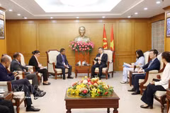 会见现场。图自越通社