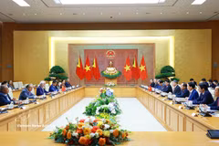 会谈现场。图自越通社