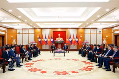 会见现场。图自越通社