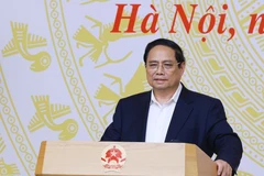 政府总理范明政。图自越通社