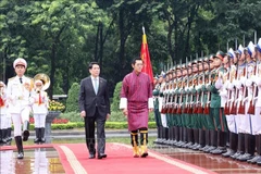 越南国家主席梁强主持隆重的国宾仪式欢迎不丹国王与王后访问。图自越通社