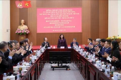 会见现场。图自越通社