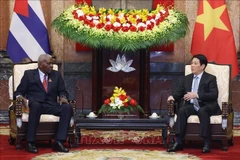 越南国家主席梁强会见古巴全国人民政权代表大会主席埃斯特万·拉索·埃尔南德斯。图自越通社