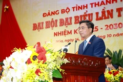 阮尹英同志连任清化省委书记。图自越通社