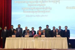 签署仪式现场。图自越通社