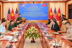 签署仪式现场。图自越通社