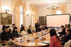 座谈会现场。图自越通社