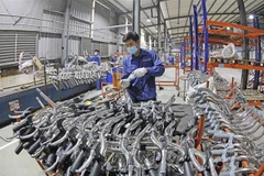 在统一股份公司生产自行车。图自越通社