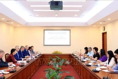 会见现场。图自越通社