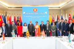 各国代表合影。图自越通社