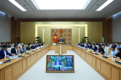 会议现场。图自越通社