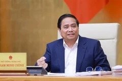 范明政总理发表总结讲话。图自越通社