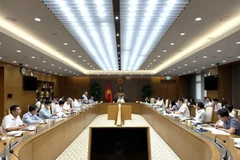 会议场景。图自越通社