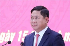 越南国会常务委员会审议关于免去陈国南的第十五届国会代表职务的决定。图自越通社