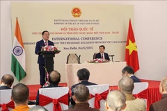 阮仲义在题为“胡志明主席与越印友谊和团结”的国际研讨会发表讲话。图自越通社