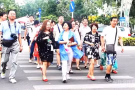 赴庆和旅游的一个中国旅游团。图片来源：nhandan.vn