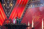 在《祖国在我心中》政治主题音乐会上再现红场阅兵画面