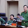 公安部警察调查局副局长黎文新少将发言。图自政府报