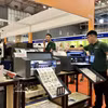第23届越南国际印刷及包装工业展上展示的多款自动化机械设备。图自越通社