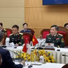 越南国防部副部长黄春战上将在对话上发表讲话。图自越通社