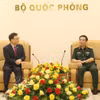 政府副总理兼国防部长潘文江大将会见韩国驻越南特命全权大使崔泳三。图自越通社