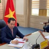 越南农业与环境部代理部长陈德胜签署协议。图自越通社