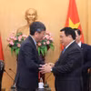 胡志明国家政治学院院长阮春胜教授会见印度共和国驻越特命全权大使采林·W·谢尔巴。图自越通社
